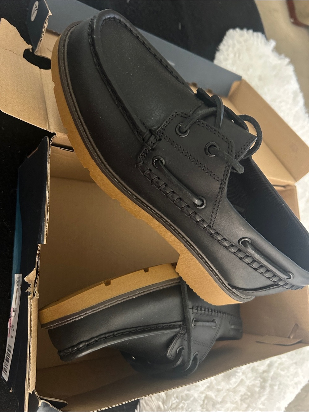 Sperry Black Leather Lug Boat Shoe with Brown Welt